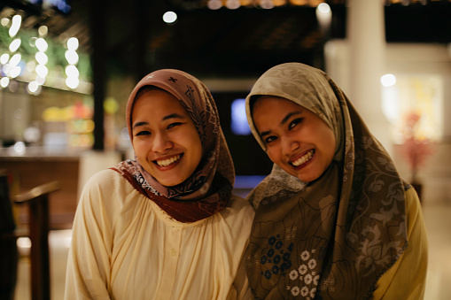 portrait smiling muslim woman