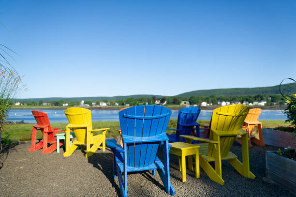 istock Multicolor Adirondack chairs facing the Bay of Fundy 1392244664