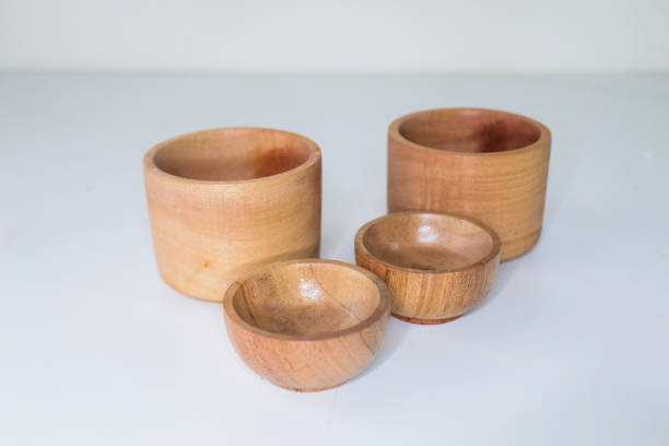 istock Wooden bowl isolated on white background 1392246290