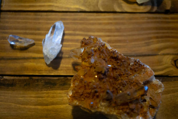 istock Various sizes of quartz crystals on wood display 1392246913