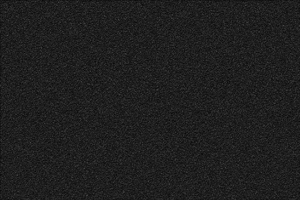 istock black asphalt surface texture for poster, banner, web page background. copy space 1392247948