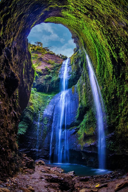 istock Madakaripura Waterfall (Probolinggo) is the tallest waterfall in deep Forest in East Java, Indonesia. 1392251006