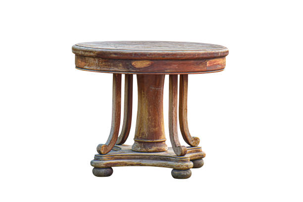 Antique wooden round table isolated on white backgrounds work with clipping path.