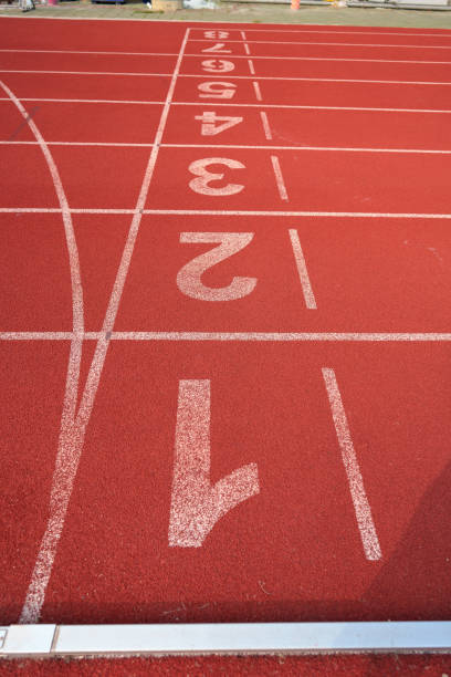 istock nobody empty Athlete Track or Running Track background for training 1392261382