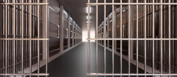 prison corridor, jail cell and open metal bars door, empty dark facility interior, 3d render - prison stockfoto's en -beelden