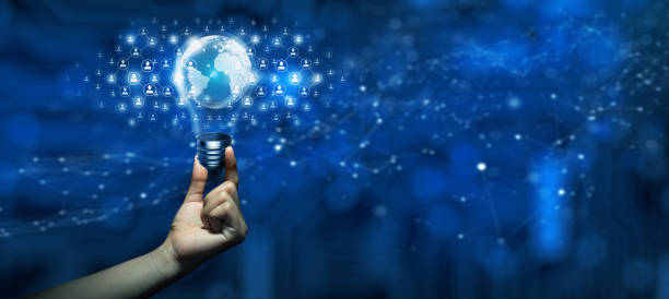 istock Hand holding Light bulb people network and global communication concept Business technology. Copy space. 1392265560