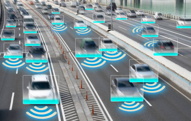 istock Autonomous Self Driving Cars Moving Through City. 1392265608