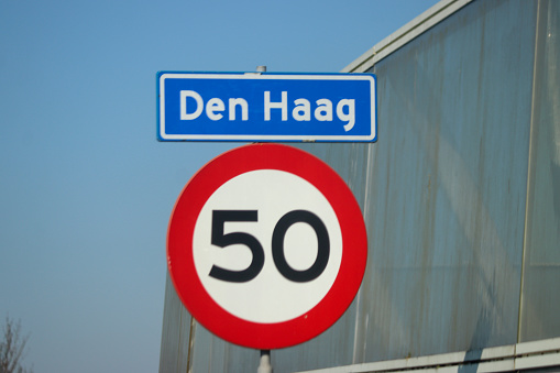 Sign with maximum speed 50 km/h and built-up area of The Hague
