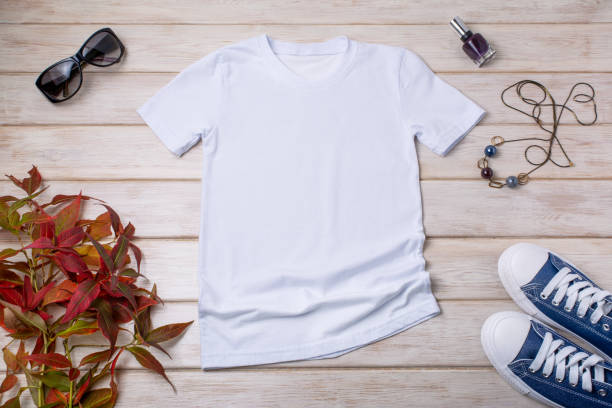istock Womens white T-shirt mockup with blue sneakers 1392269176