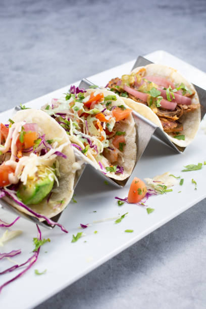 istock tacos on taco holder 1392270722