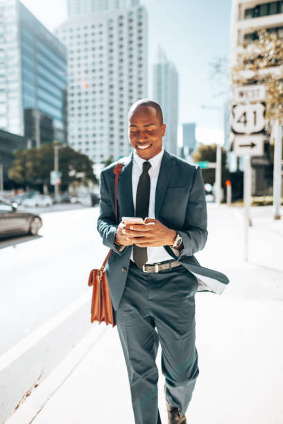 istock business man with smartphone in Miami 1392271115