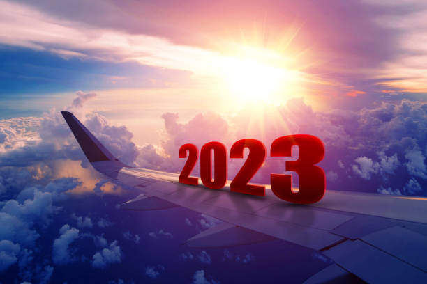istock Airplane wing flying at sunrise in 2023 1392274638