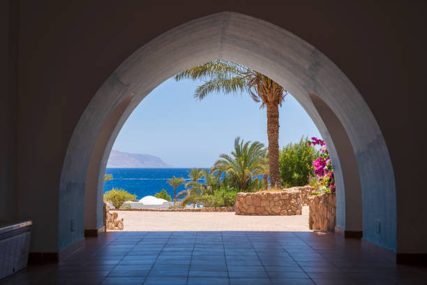 Beautiful arched doorway in a building on the shores of the Red Sea at morning in the resort town of Sharm El Sheikh, Egypt, Africa stock photo