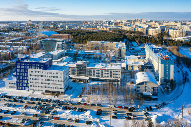 Surgut city in winter. Buildings of the district Clinical Hospital. Aerial view. stock photo