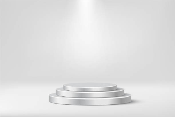 istock 3d cylinder podiums for product presentation in showroom, luxury silver platform 1392279572