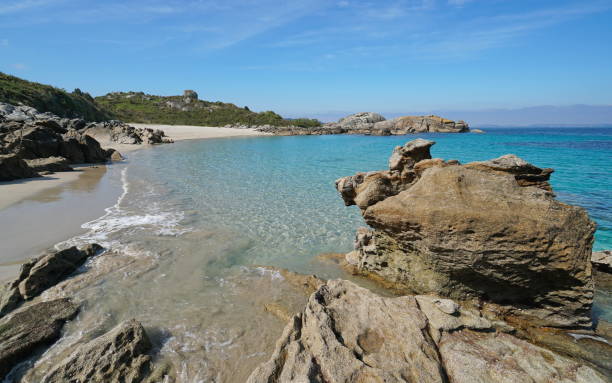 istock Beach shore with rocks and sand in Galicia Spain 1392281497