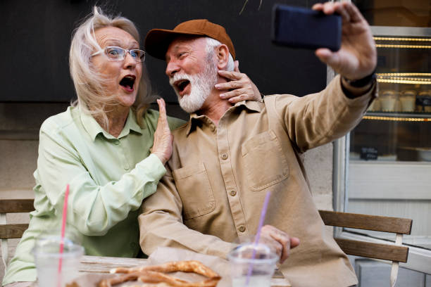 istock Lovely senior tourists goofing outside 1392284748