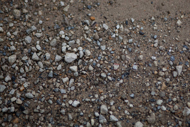 istock Rocks and pebbles by the water 1392287271