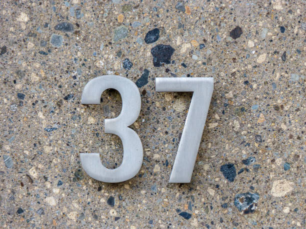 istock Metal home number on a wall 1392288797