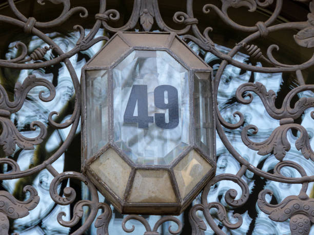istock Glass home number on a wall 1392288832