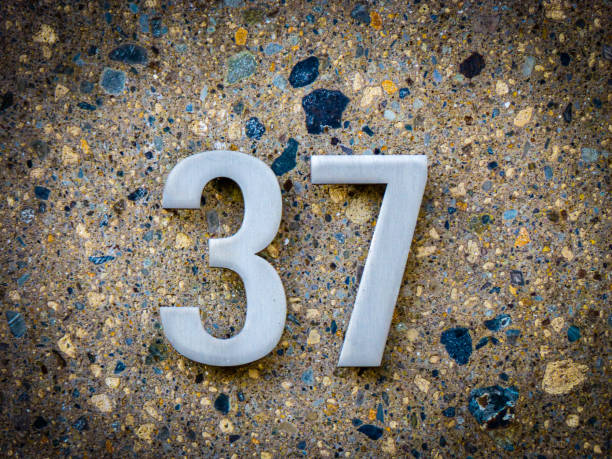 istock Metal home number on a wall 1392288836