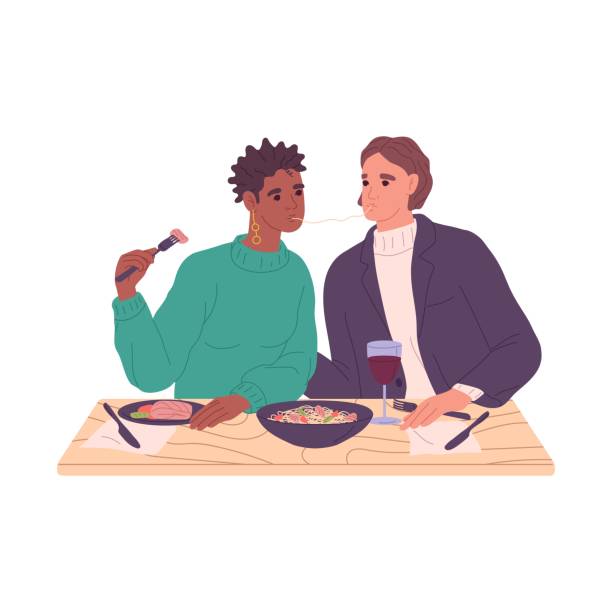 一緒にスパゲッティを食べる愛のカップル。ロマンチックなディナーでイタリア料理、パスタ、ワインを片手に、テーブルに座って食事を分かち合う男女。白い背景に分離されたフラットベ� - dining table table cartoon dining点のイラスト素材／クリップアート素材／マンガ素材／アイコン素材