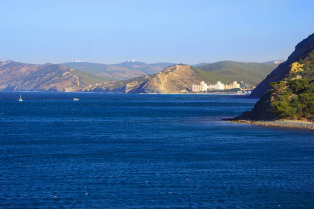Blue sea and mountains on a sunny day. High quality photo