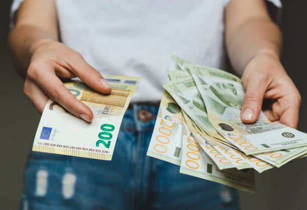 istock money banknotes in hands, paper currency in hands 1392299094