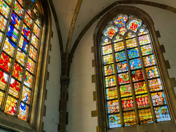 istock Stained glass church windows St Bavo 1392299881