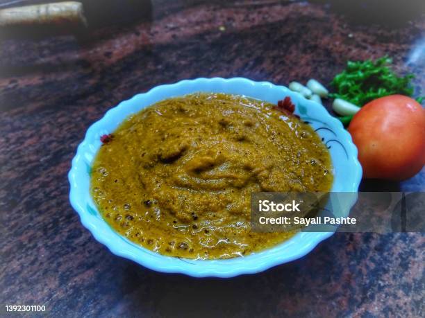 Kokani Style Fish Coconut Curry Paste Its Ingredients Tomato Chilli Garlic And Coriander Stock Photo - Download Image Now