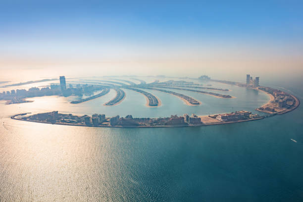 Dubai Palm Jumeirah island aerial view in United Arab Emirates Dubai Palm Jumeirah island aerial view in United Arab Emirates. View from helicopter jumeirah stock pictures, royalty-free photos & images