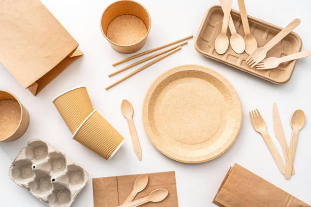 istock Disposable eco friendly brown cardboard and wood products. 1392302583