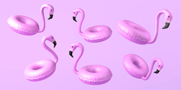 istock Summer concept with flamingo floats floating on pink background. Copy space. 3D illustration. 1392305257