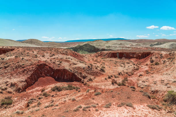 istock Red sand mountains in the desert area 1392305499