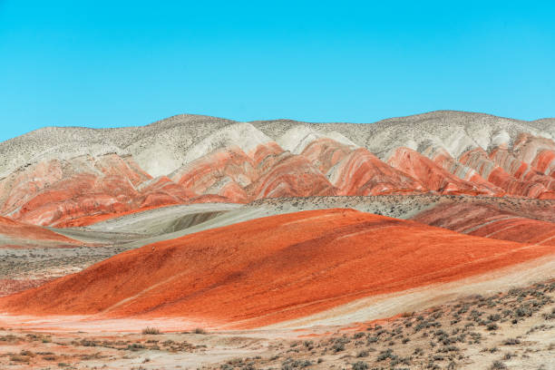 istock Red sand mountains in the desert area 1392305517