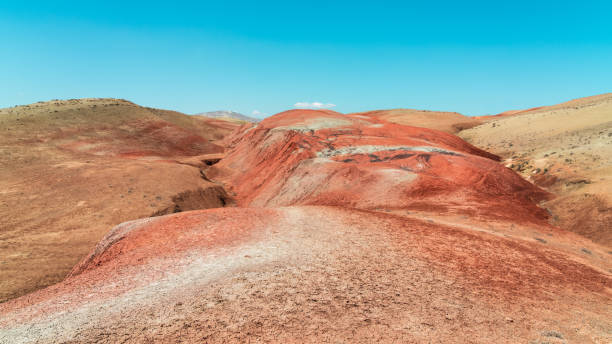 istock Red sand mountains in the desert area 1392306202