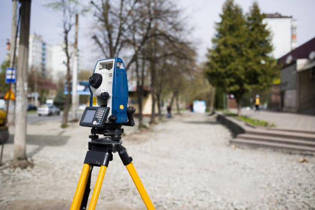 istock Horizontal shot of  cheap geodesy level device on road . Copy sapce 1392310064