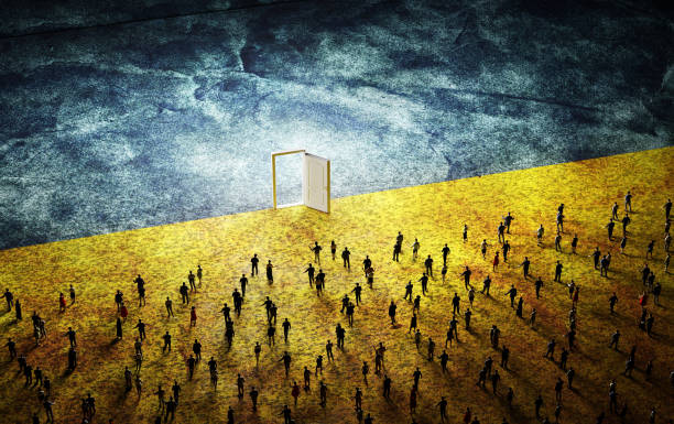 istock People on Ukraine flag walking to open door 1392311341