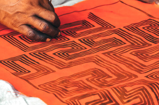 Hand painting geometrical tribal art of the Asurini indigenous tribe. Xingu Rive, Baixo Amazonas, Amazon, Brazil. 2007.