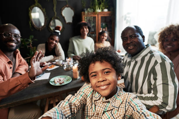 istock Happy familly celebrating holiday together 1392313509