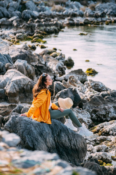 istock Young Woman Spending Time on the Beach at the Weekend 1392319995