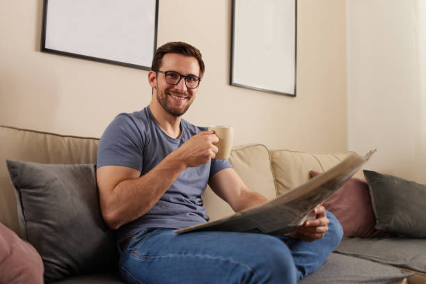 istock Newspapers and morning coffee 1392320923