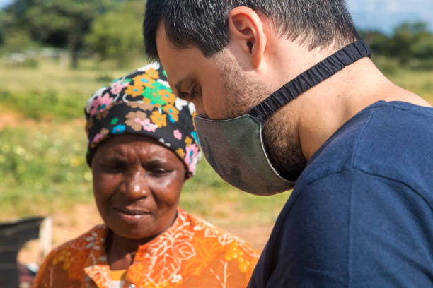 istock African woman with mask 1392322378