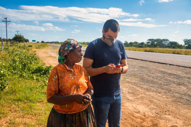istock African villager talking 1392322380