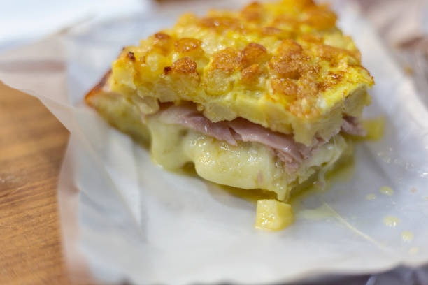 istock Potato tortilla with cheese in an informal spot 1392325548