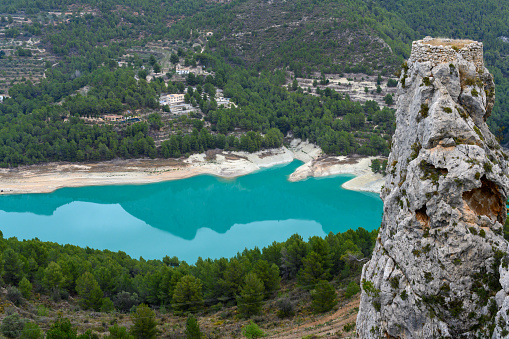 Landscape of the Guadalest lake, village of Alicante in Spain. Turquoise blue reservoir