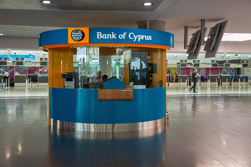 Larnaca, Cyprus - May 31, 2021: Bank of Cyprus office in Glafcos Clerides Larnaca international airport. BoC is a Cypriot financial services company established in 1899.