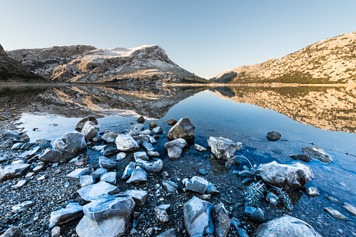 Frozen Servieres lake and Sancy massif in Auvergne, Puy-de-Dome