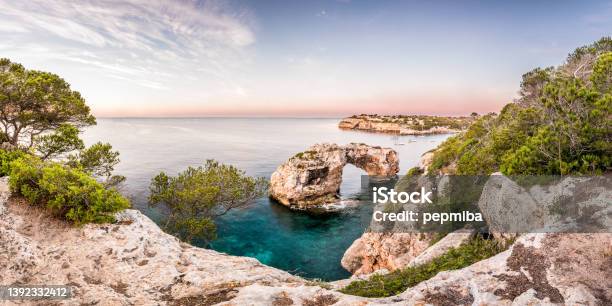 Es Pontas Natural Stone Arch In The Sea Stock Photo - Download Image Now - Majorca, Santanyí, Panoramic