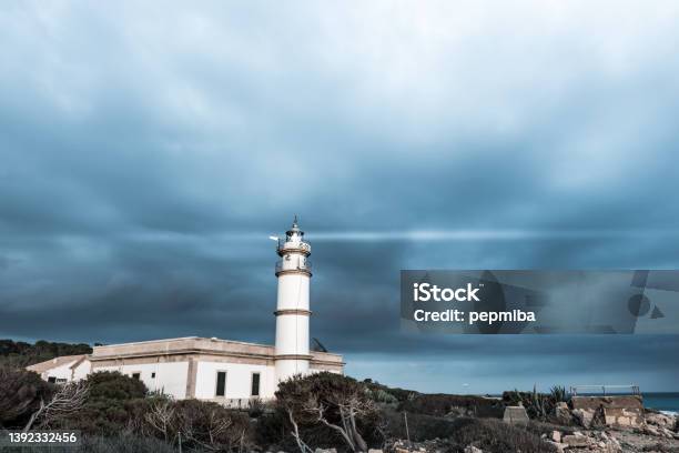 Cap De Ses Salines Lighthouse Stock Photo - Download Image Now - Architecture, Balearic Islands, Beauty In Nature